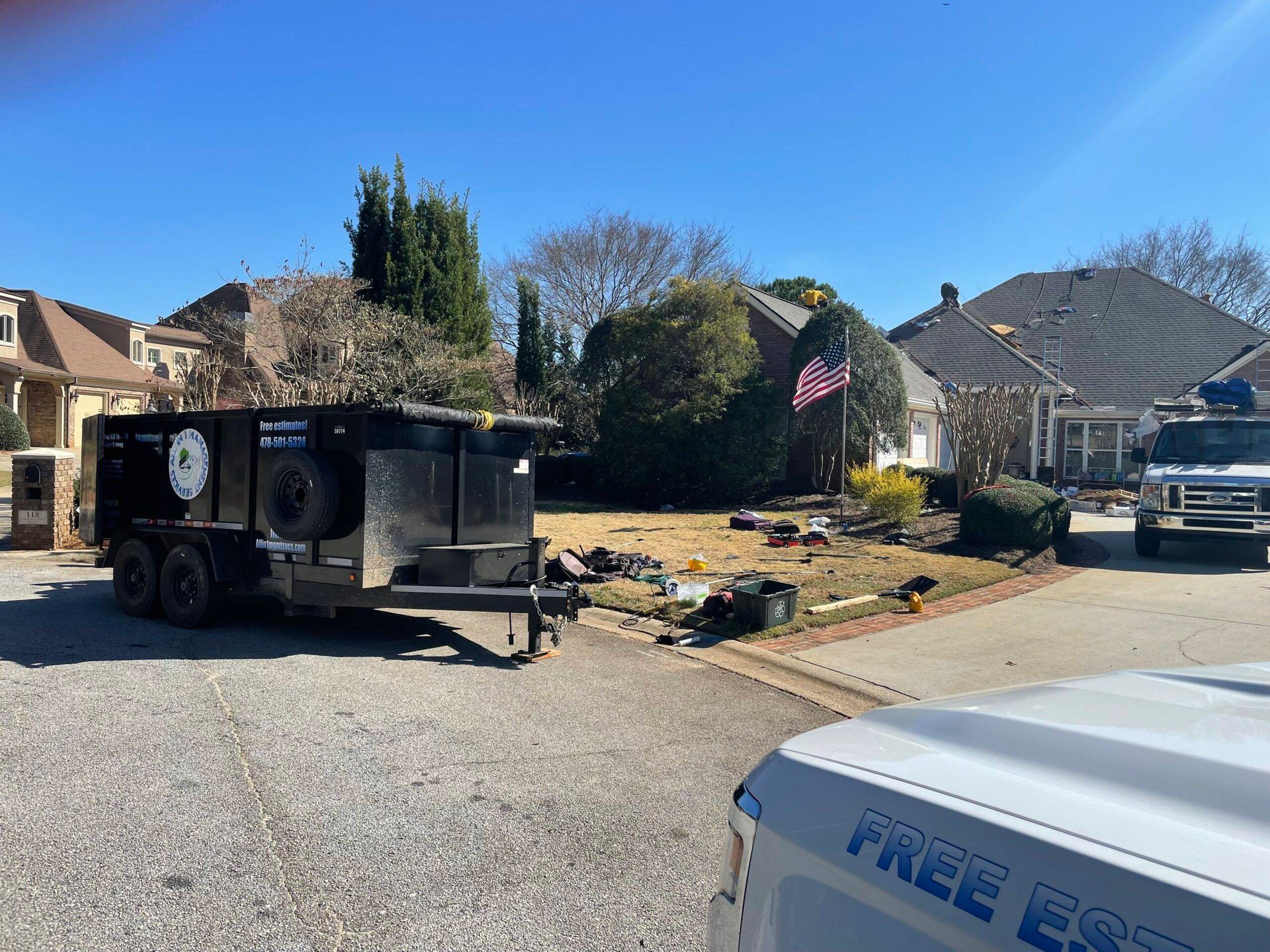 All In 1 Junk Removal trailer and service vehicle at a Central Georgia cleanup